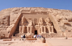 Temple of Ramesses II at Abu Simbel - smaller figures of his wife Nefetari and children can be seen at his feet.